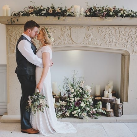 Fantastic photo of a fireplace we helped supply and fit to Twndwrhall in north Wales beautifully dressed with flowers by sioned at tulipa flowers. North Wales, North West, Wirral, Liverpool & Cheshire UK