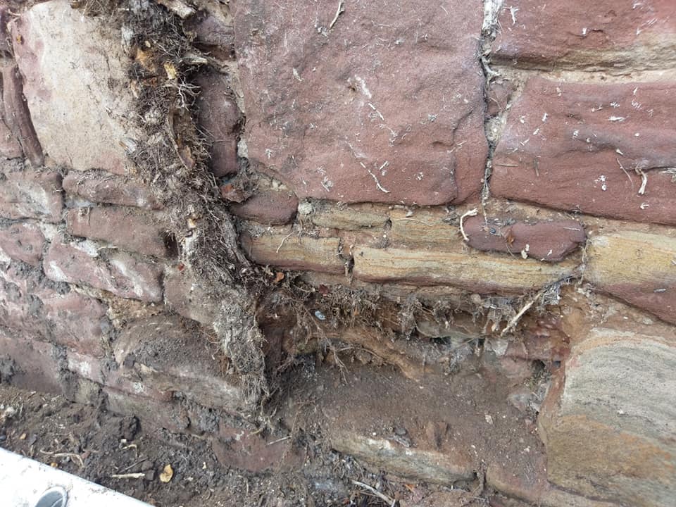 Another sandstone wall rebuilt and repointed in lime mortar on the wirral today. North Wales, North West, Wirral, Liverpool & Cheshire UK